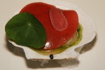 Magdalen Island Scallop marinated with ramp shallot rhubarb, maple strawberry rhubarb sheet gel nast, radish