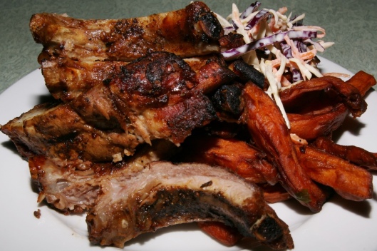 The Original Ribs - baby back pork ribs with slow stewed BBQ sauce and yam fries $25