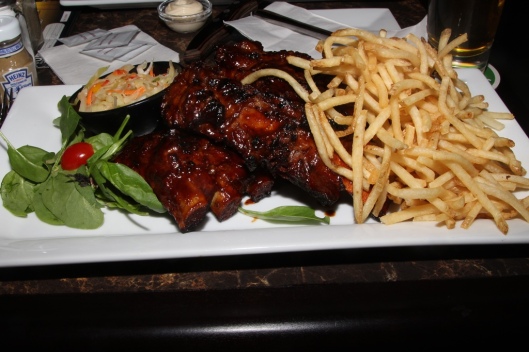 Meat Lover's Combo for One $26.95 - ½ rack Baby Back Ribs, 2 Angus Beef Rib Bones, coleslaw, fries