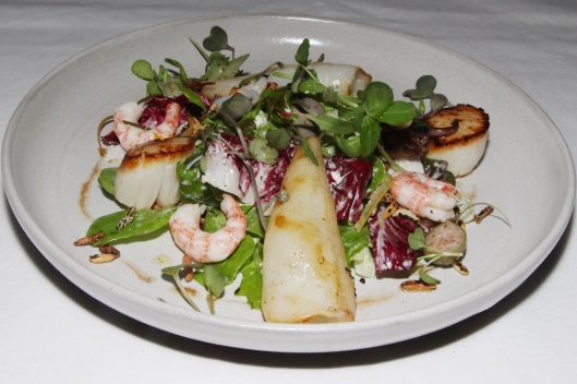 Seafood salad - wild sea scallops, calamari, pickled shrimp, lemon, chilies, basil $24
